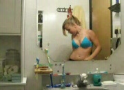 Blonde Teen Touching Herself In Bathroom
