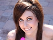 Horny brunette uses a massive toy