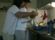 Couple having sex in kitchen