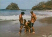 Rita triple teamed on beach