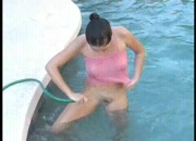 Avery sticks a garden hose in her pussy